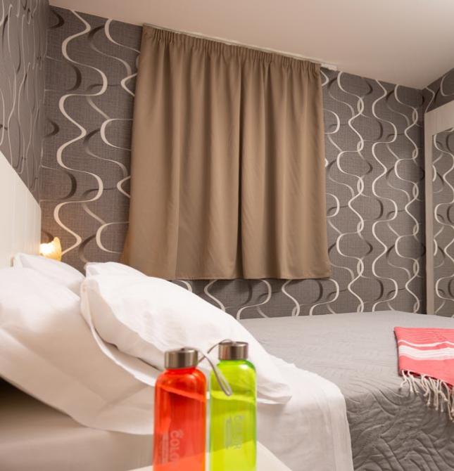 Cozy room with modern decor and vibrant colors.